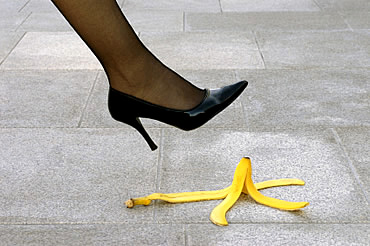 Woman about to step on banana peel